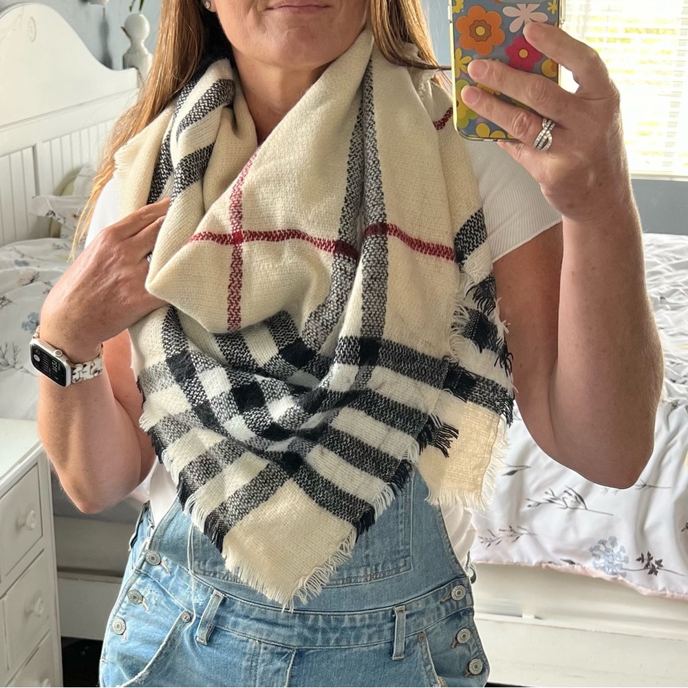 Cream with black and maroon stripes blanket scarf. 50”x50”